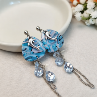 Polymer Clay Handcrafted Earrings Featuring a Dolphin Charm and Silver Dangle Chains